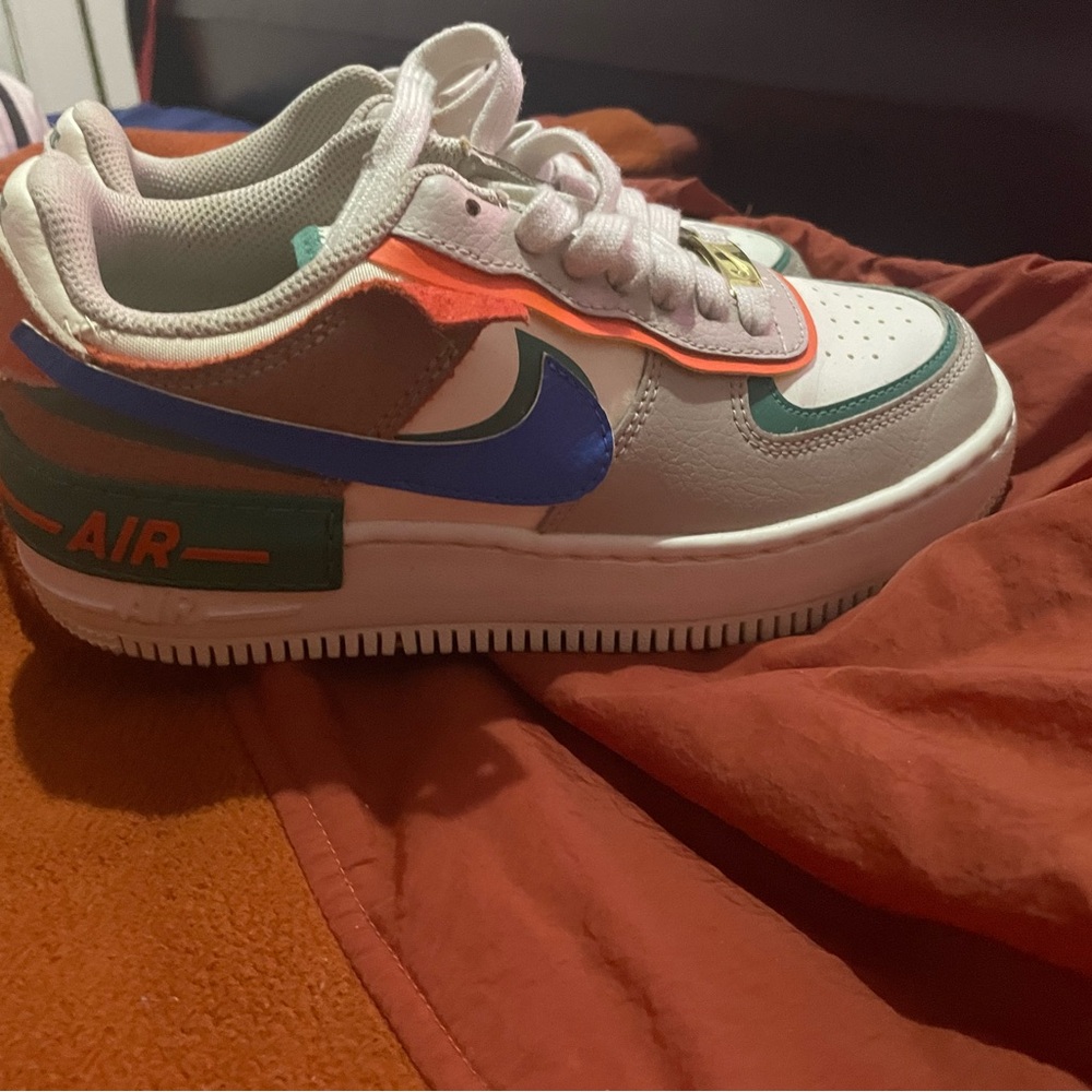 Nike Air Low-Top Sneaker in White with Blue & Teal Accents